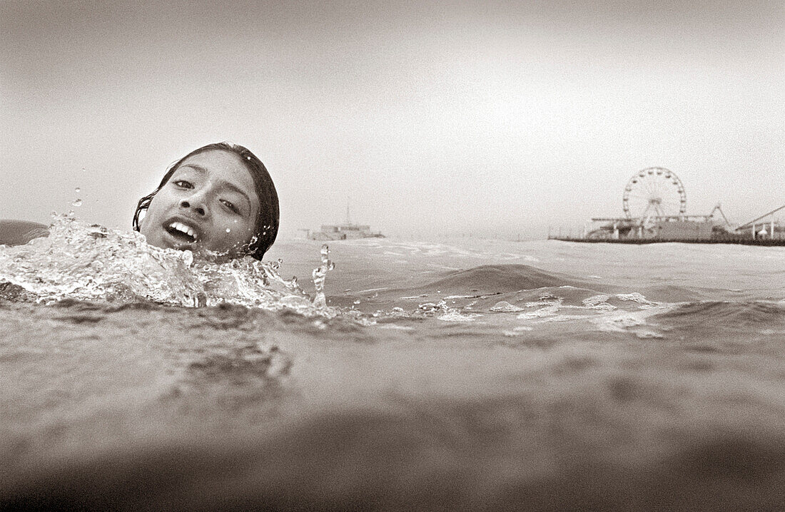 USA, California, portrait of girl lifeguard training, Santa Monica (B&W)