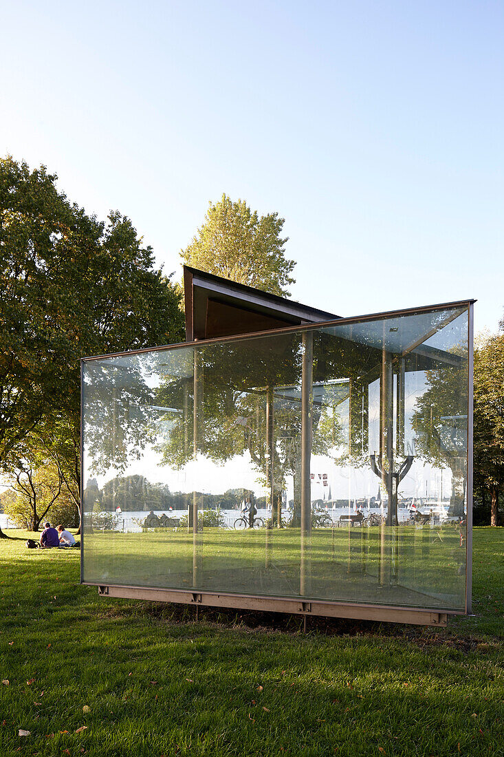 Glass pavilion reflecting Outer Alster Lake, art installation in a park near Faehrhausstrasse, East bank of the Outer Alster Lake, Aussenalster, Hamburg, Germany