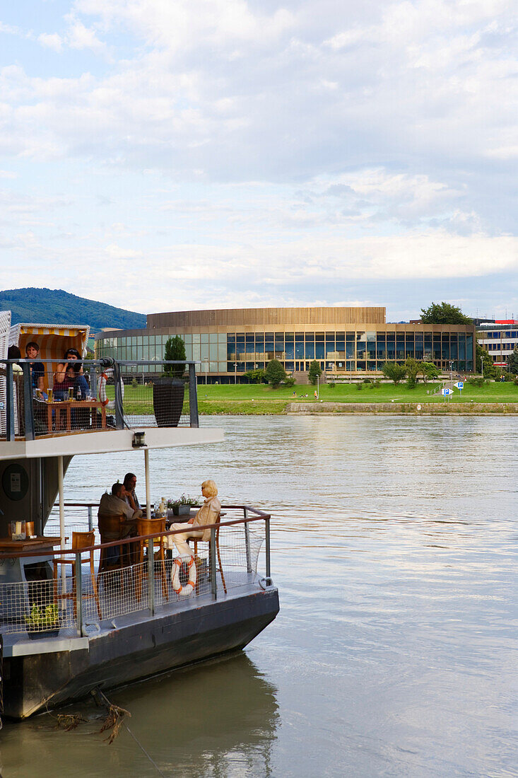 Cafe Lido on the river danube and Bruckner concert hall, Linz, Upper Austria, Austria