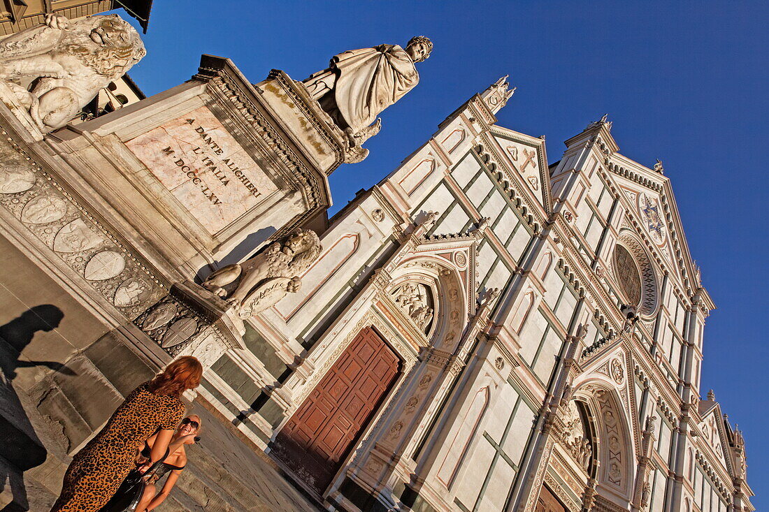 Facade of basilica Santa Croce, also known as the pantheon of Florence and the statue of Dante Alighieri, Florence, Tuscany, Italy