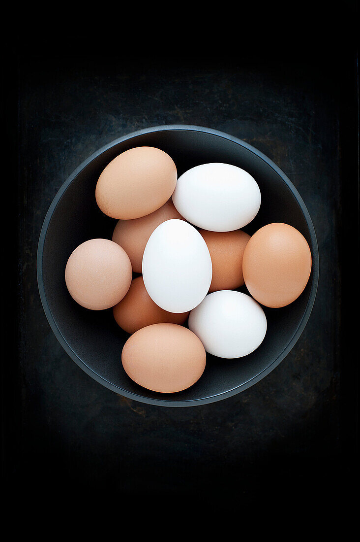 Bowl of multicolored eggs