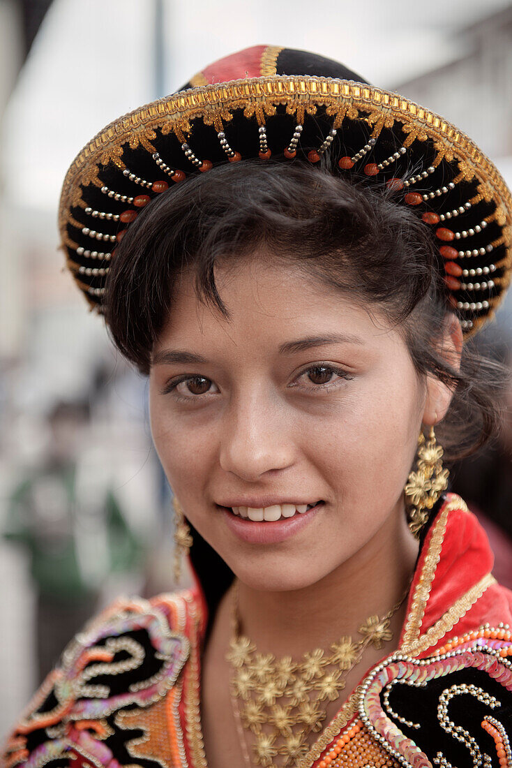 Portrait of young peruvian girl with tradtional dresses during a procession in Cusco, Cuzco, Peru, Andes, South America