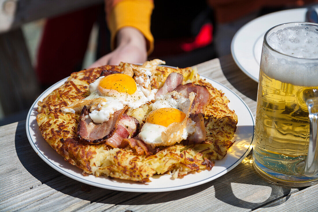 Roesti with fried egg and bacon, Zermatt, Canton of Valais, Switzerland