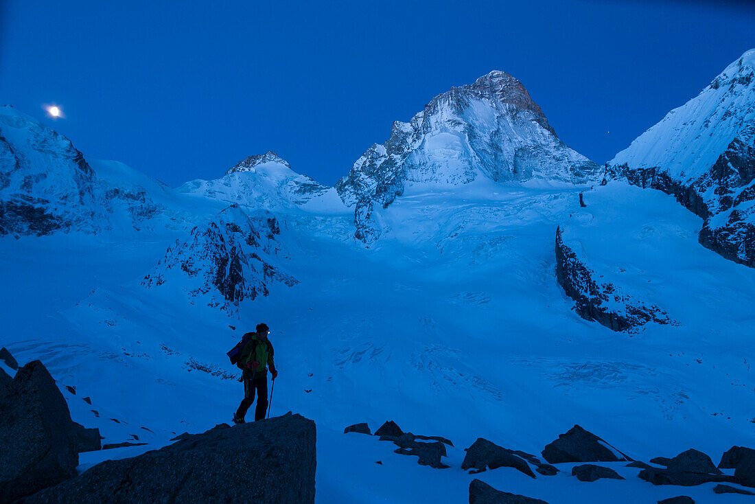 Skier ascending, glacier Durand and Dent Blanche in background, Val d Anniviers, Canton of Valais, Switzerland