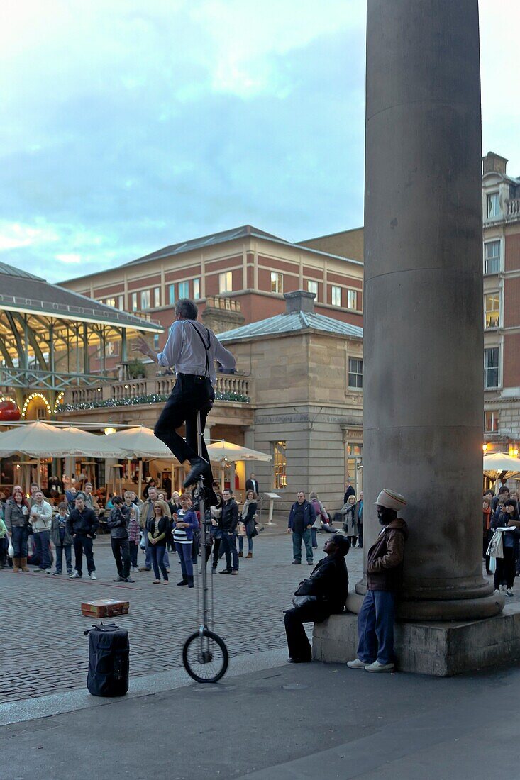 England, London, Covent Garden, Artist with a unicycle