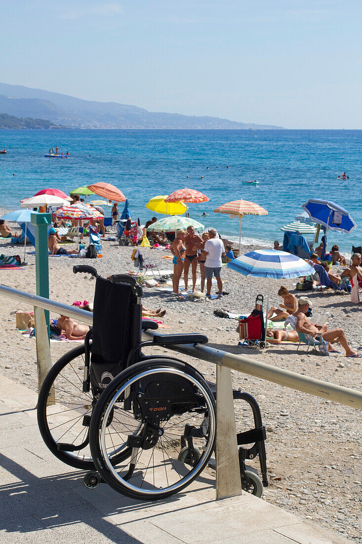 France, Provence-Alps-Côte d'Azur, Menton, Wheelchair on the beach