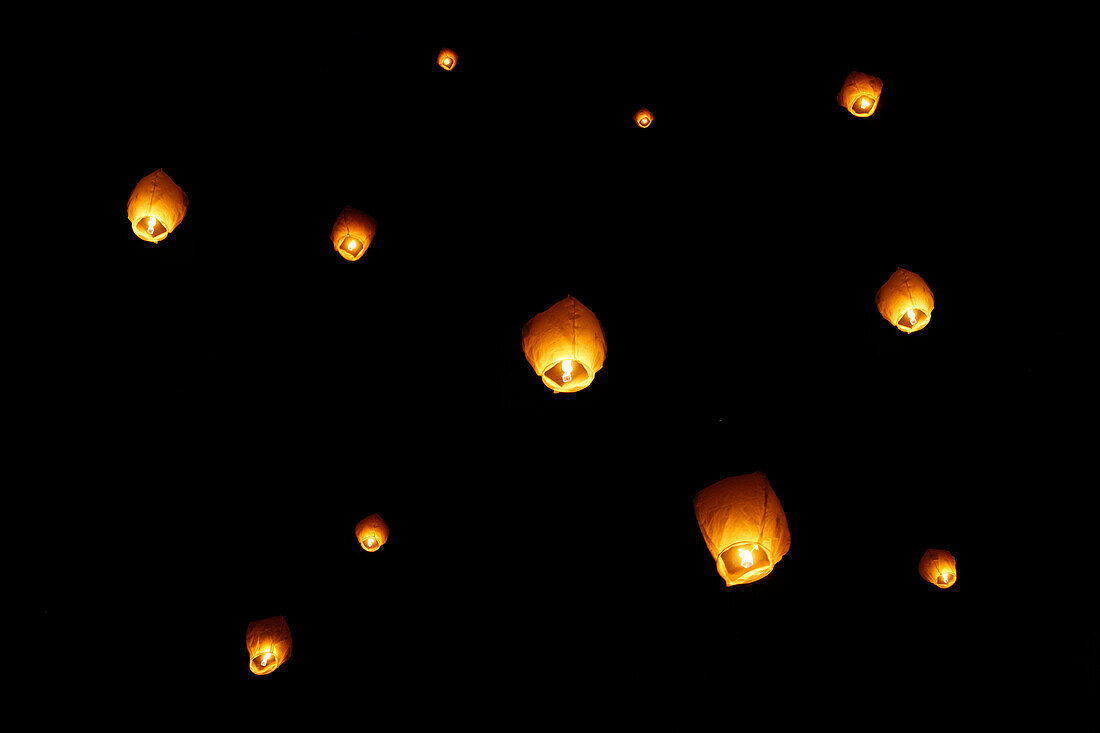 Lampions flying in the dark sky