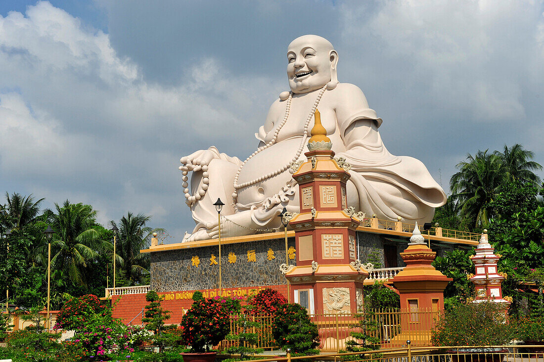 Happy Buddha statue in Vinh Trang Temple near My Tho, South Vietnam, Mekong Delta, South East Asia, Asia
