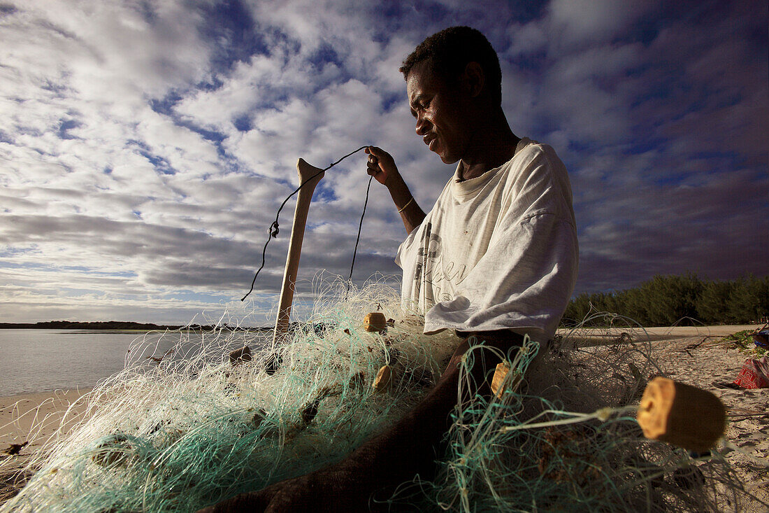Republic of Madagascar, Diana Region, Diego Suarez By, fisherman with his fishing nets