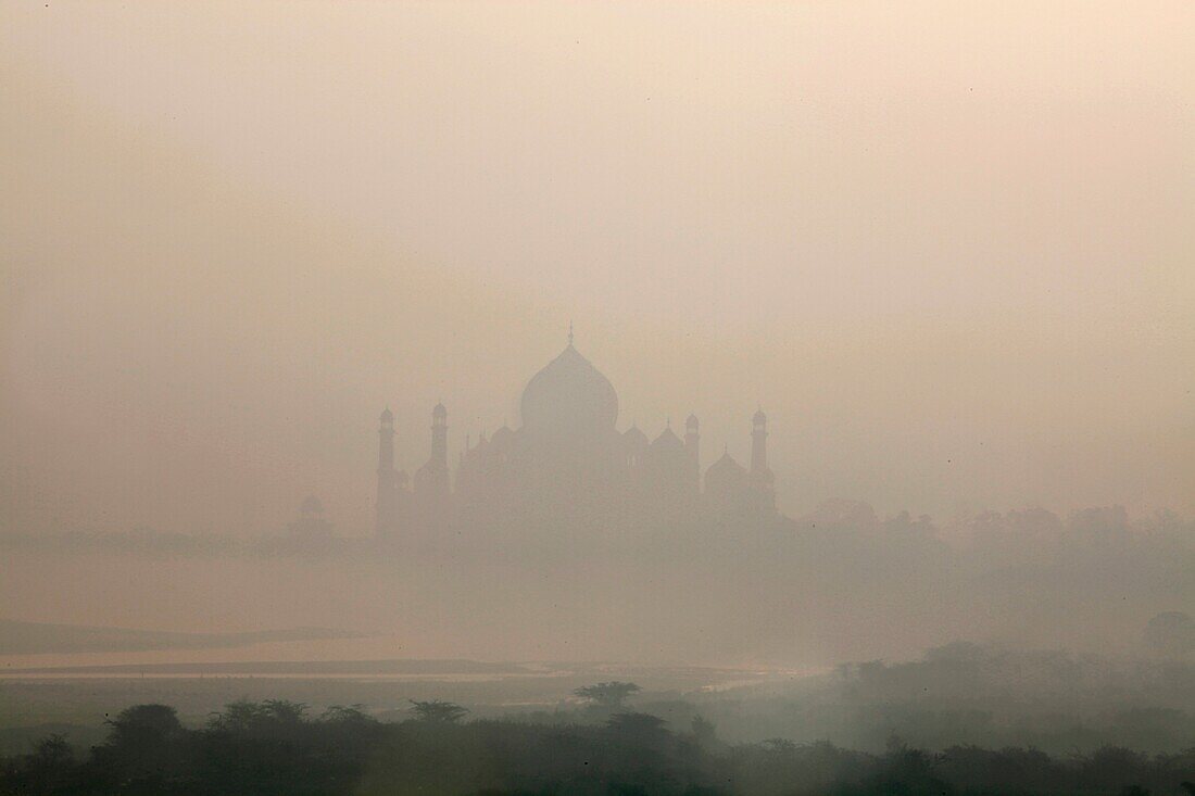 Taj Mahal in the mist Agra. India.