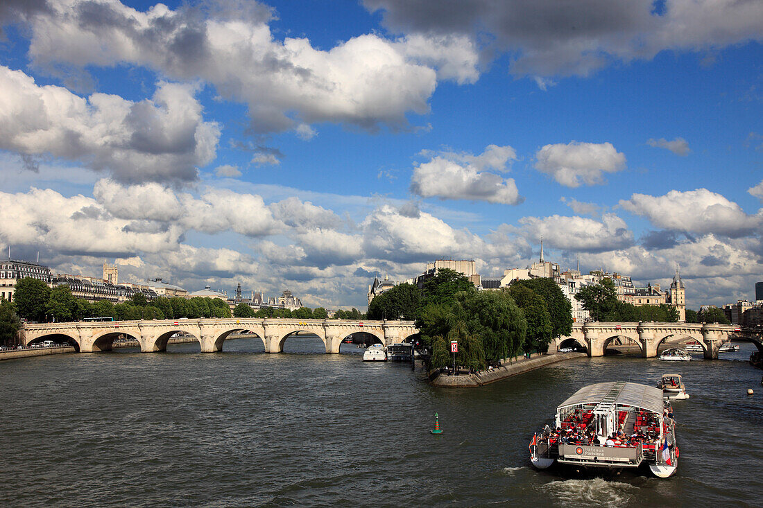 France, Paris, Seine river, Pont Neuf bridge, sightseeing boat