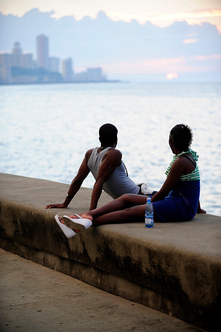 People relax at the Malecon in La Havana for sunset, Cuba