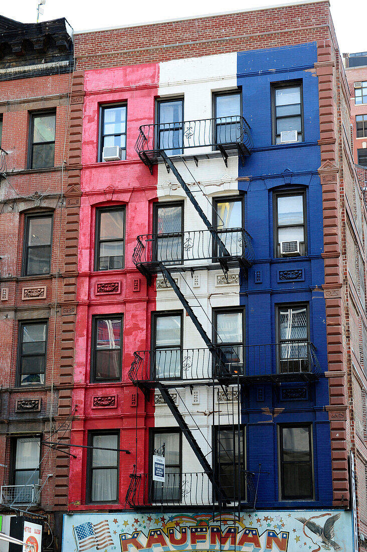 Red, white, blue building in the Little Italy section of Lower Manhattan, New York City, New York State, United State, USA