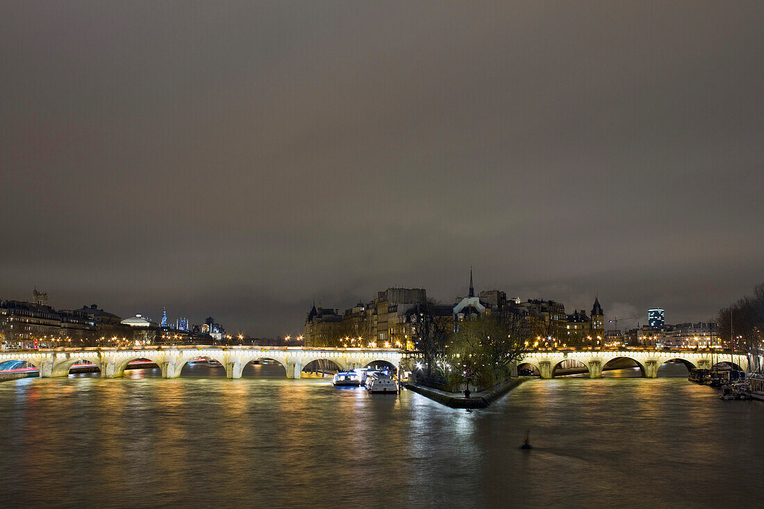 France, Paris, the Pont-Neuf and the western tip of the Ile de la Cité at night.
