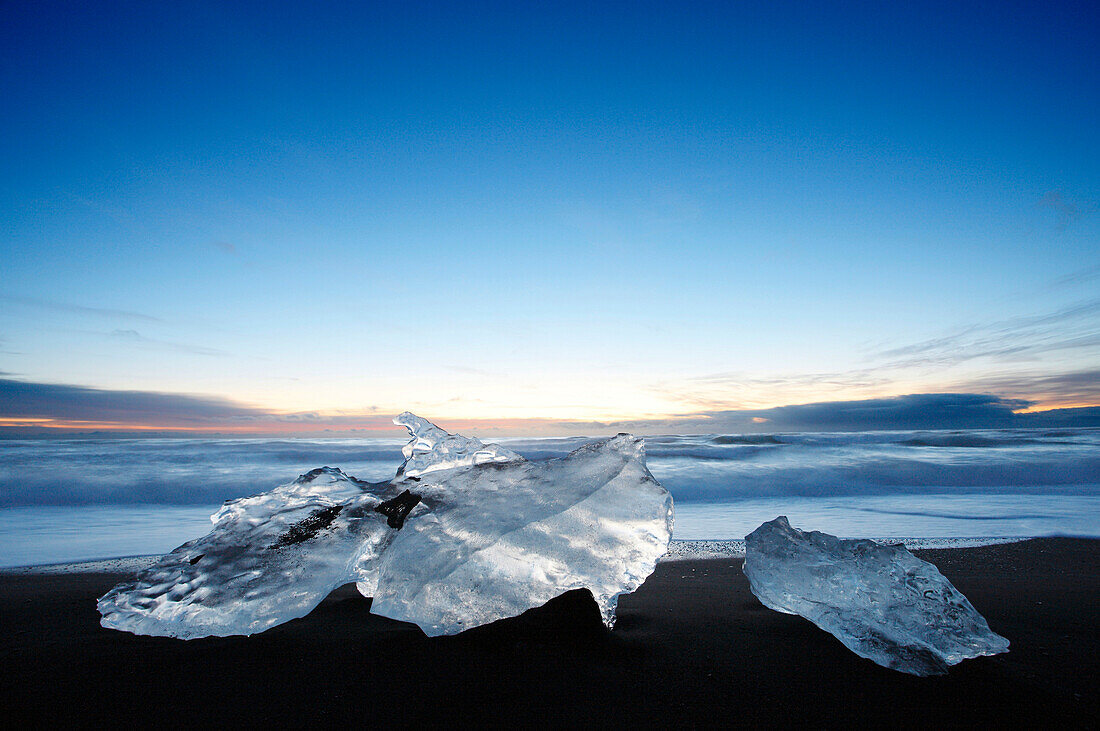 Iceland.  Southeastern Region. Jokulsarlon. Blocks of ice on the volcanic beach.