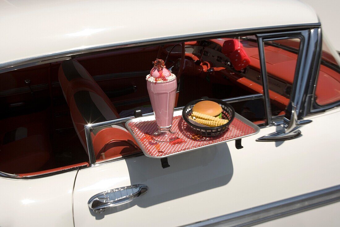 DRIVE IN FOOD TRAY ON 1950 WHITE CHEVROLET BEL AIR AUTOMOBILE