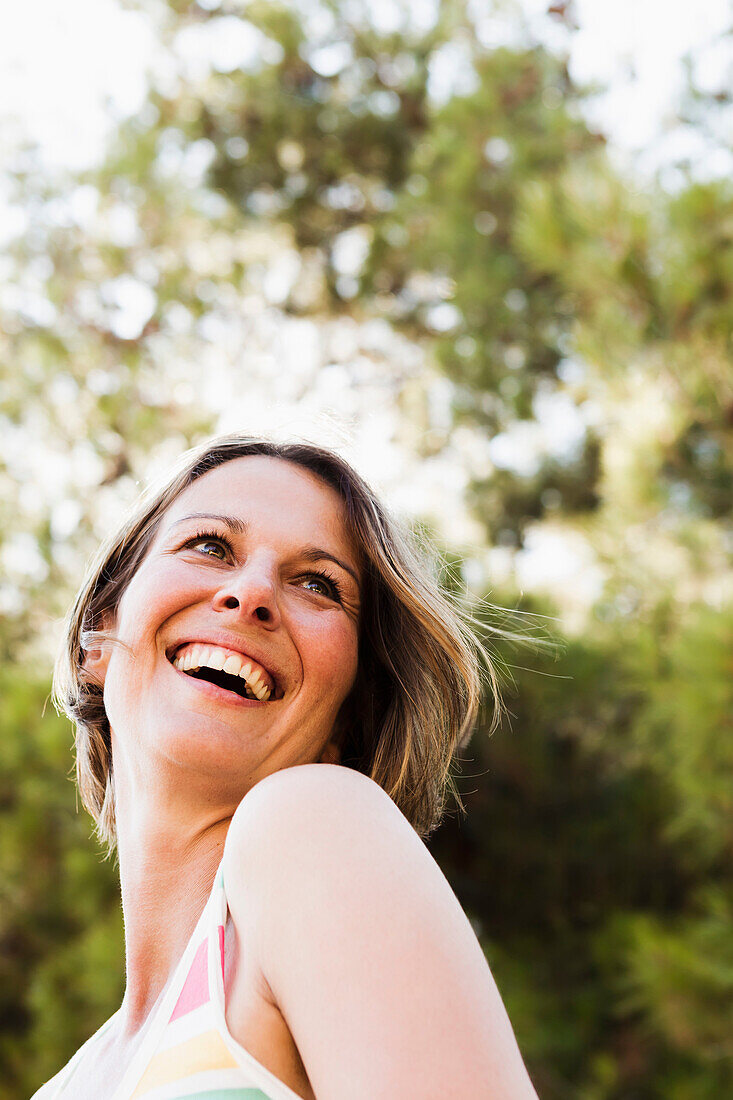 Smiling woman walking outdoors