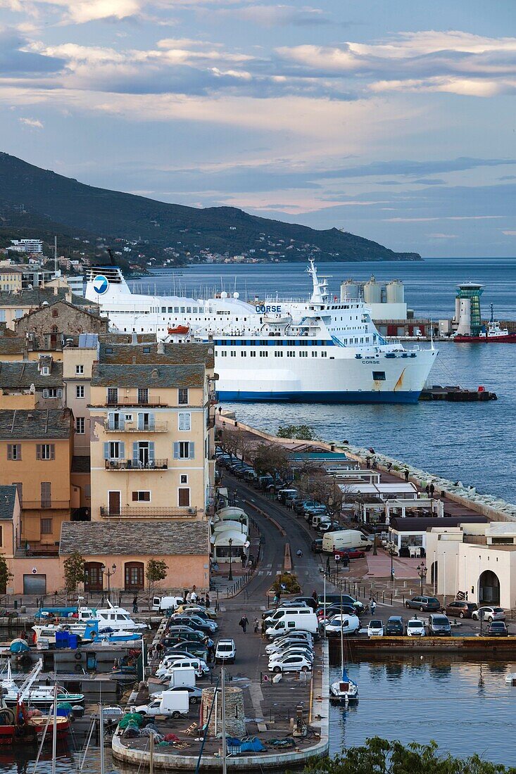 France, Corsica, Haute-Corse Department, Le Cap Corse, Bastia, elevated view of the Old Port, dusk