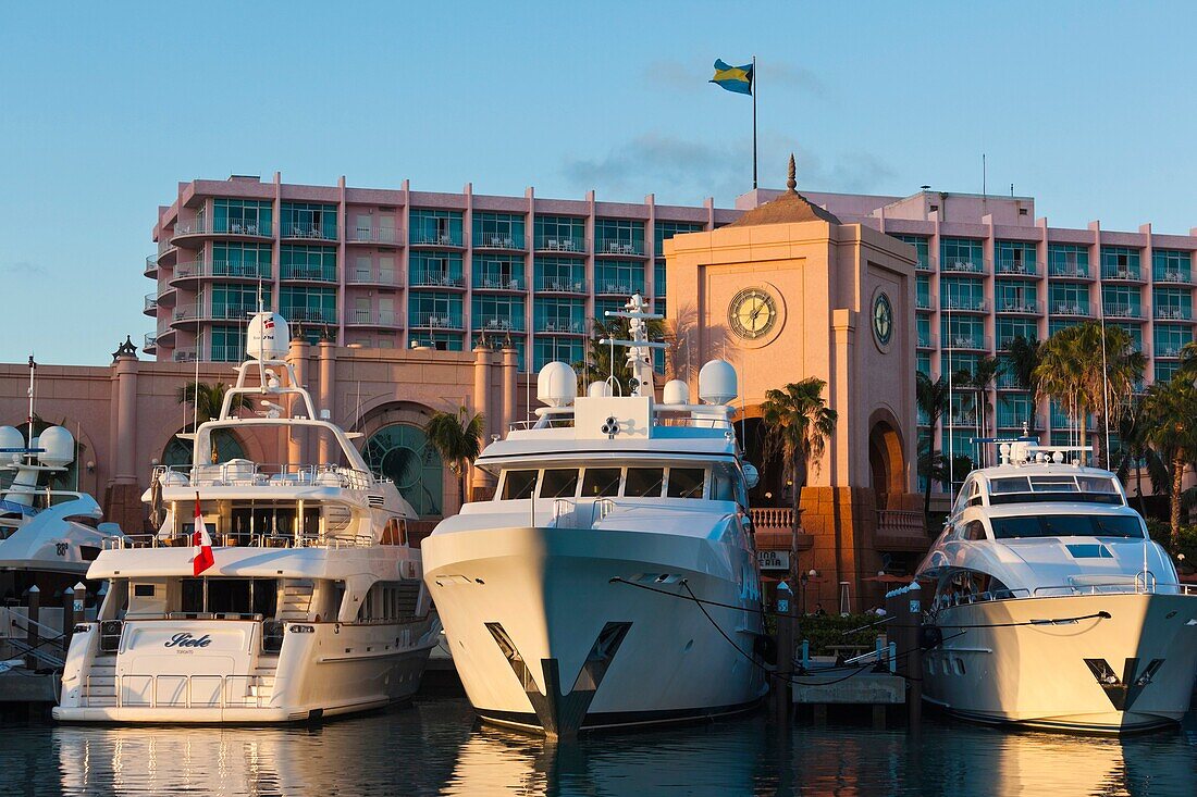 Bahamas, New Providence Island, Nassau, Paradise Island, Atlantis Hotel and Casino, Marina Village, yacht, dusk