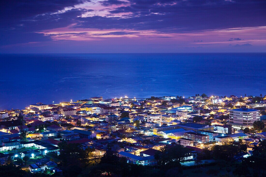 Dominica, Roseau, elevated town view, dusk