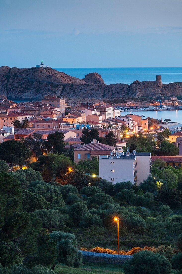 France, Corsica, Haute-Corse Department, La Balagne Region, Ile Rousse, elevated city view with Ile de la Pietra, dawn