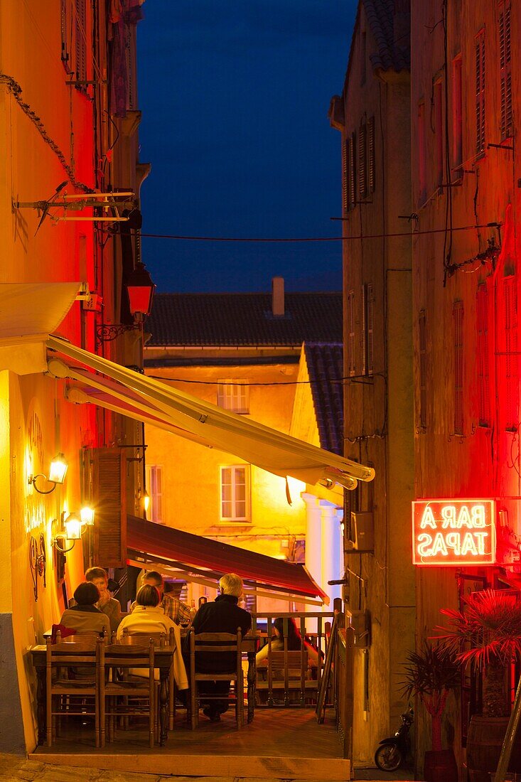 France, Corsica, Haute-Corse Department, La Balagne Region, Ile Rousse, outdoor cafes, dusk, NR