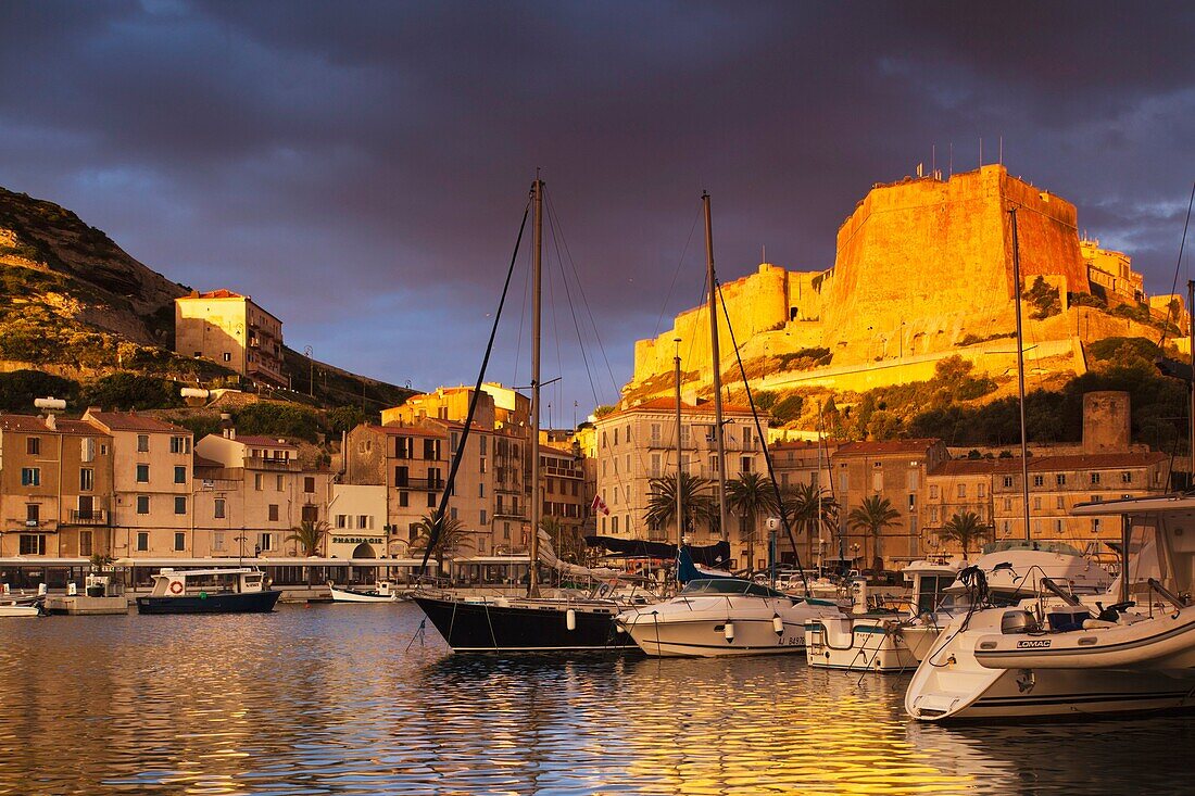 France, Corsica, Corse-du-Sud Department, Corsica South Coast Region, Bonifacio, port and Citadel, sunrise