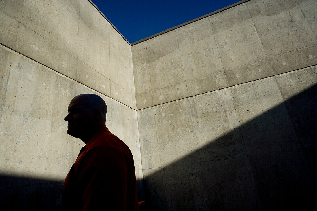 Prisoner behind Concrete Walls