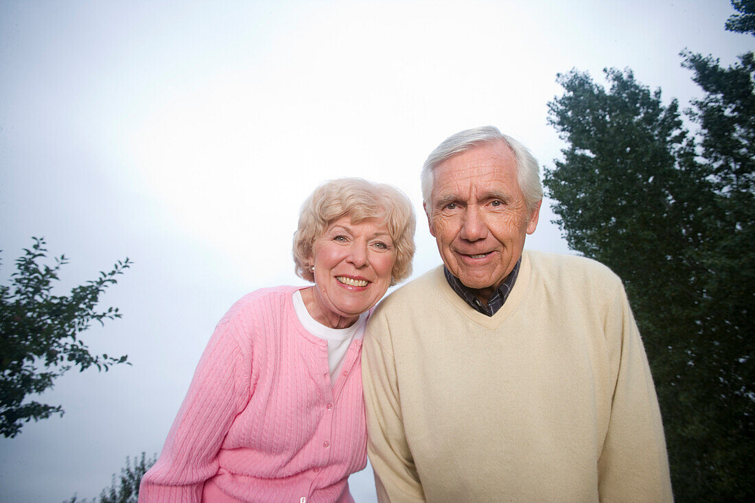 Senior Couple Smiling at Camera