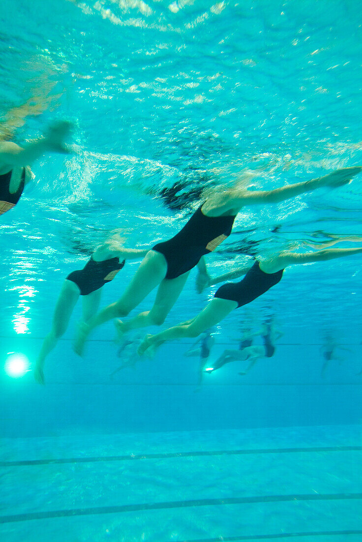 Underwater View of Women in Pool