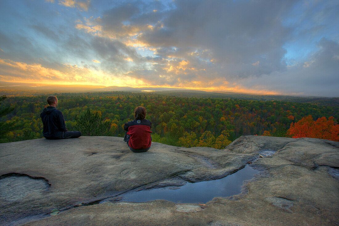Hikers on Lookout Trail at Sunset in Autumn, Algonquin Park, Ontario