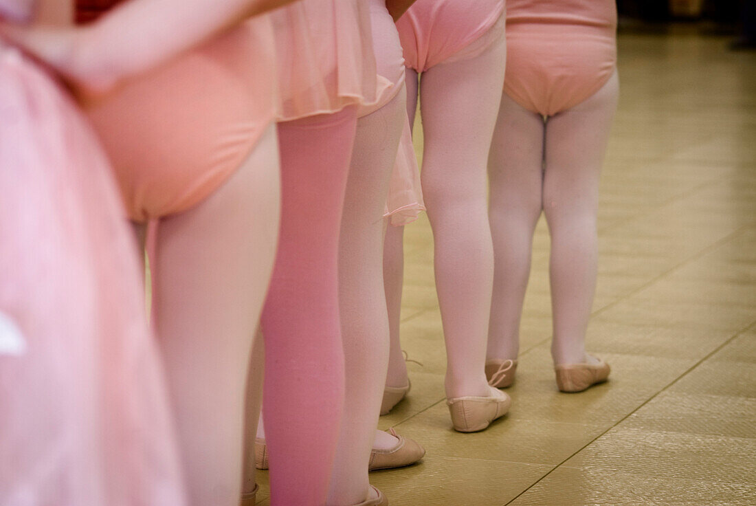 Little girls in ballet class.