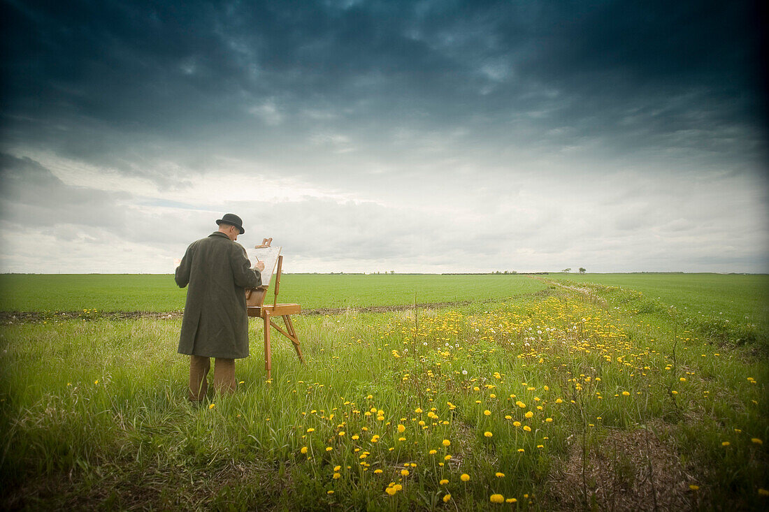 Man in Hat and Coat Painting in Field, Winnipeg, Manitoba