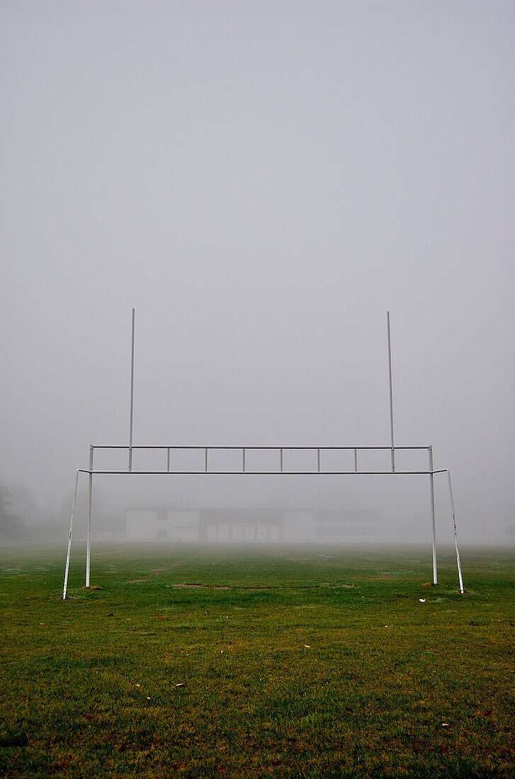 Old goalpost on a foggy football field, Otterburn park, Quebec