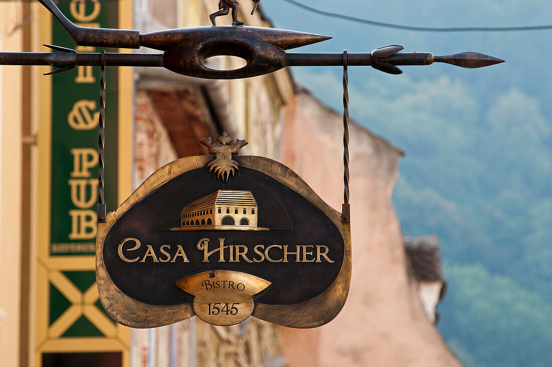 Restaurant sign in the historic centre, Brasov, Transylvania, Romania