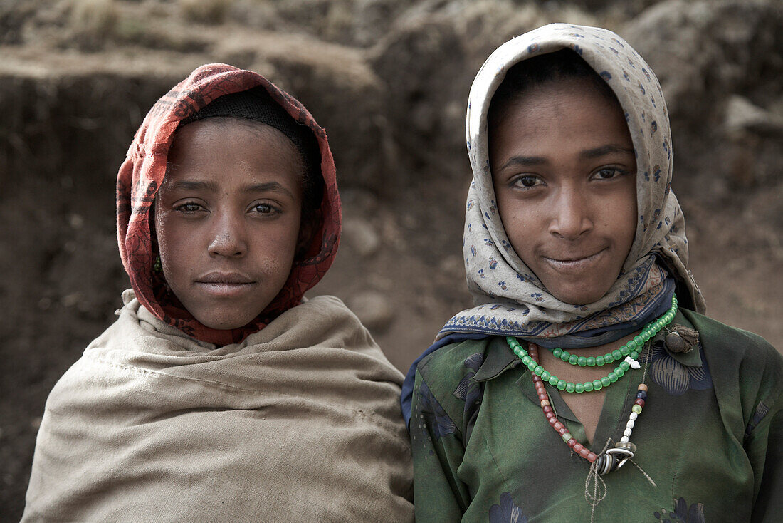 Two girls looking at camera, Simien Mountains National Park, Ethiopia