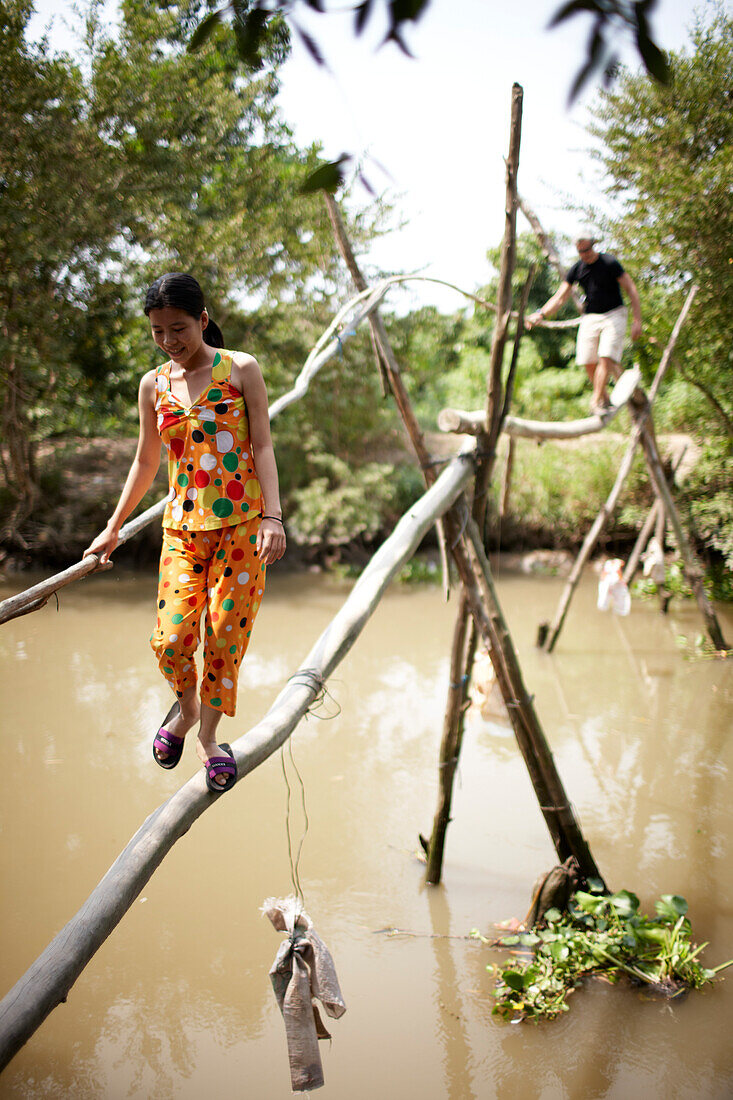 Monkey bridge crossing canal near Cao Lanh, Dong Thap, Vietnam