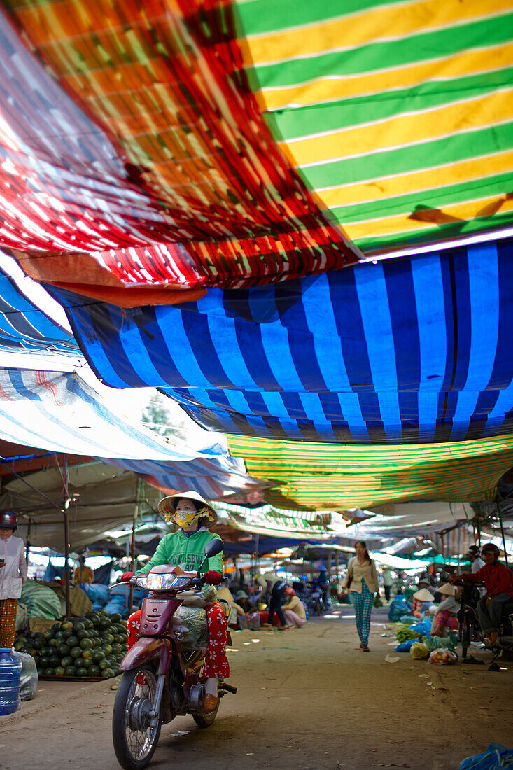 Market stalls under colourful canvas, Sa Dec, Dong Thap Province, Vietnam