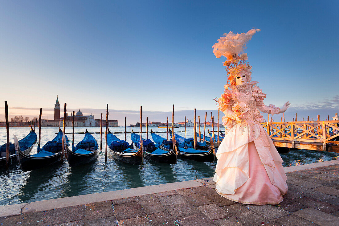 Woman wearing traditional costume and mask, Carnival of Venice, Veneto, Italy
