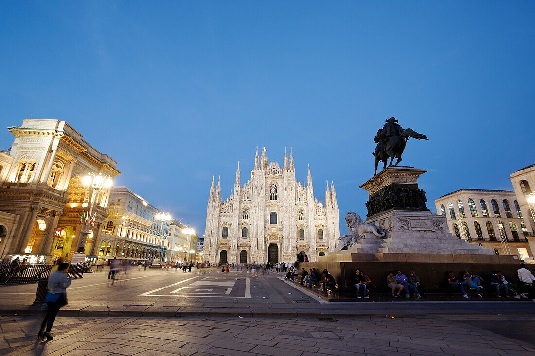 Piazza del Duomo with equestrian statue, Milan Cathedral and Galleria Vittorio Emanuele II in the evening, Milan, Lombardy, Italy