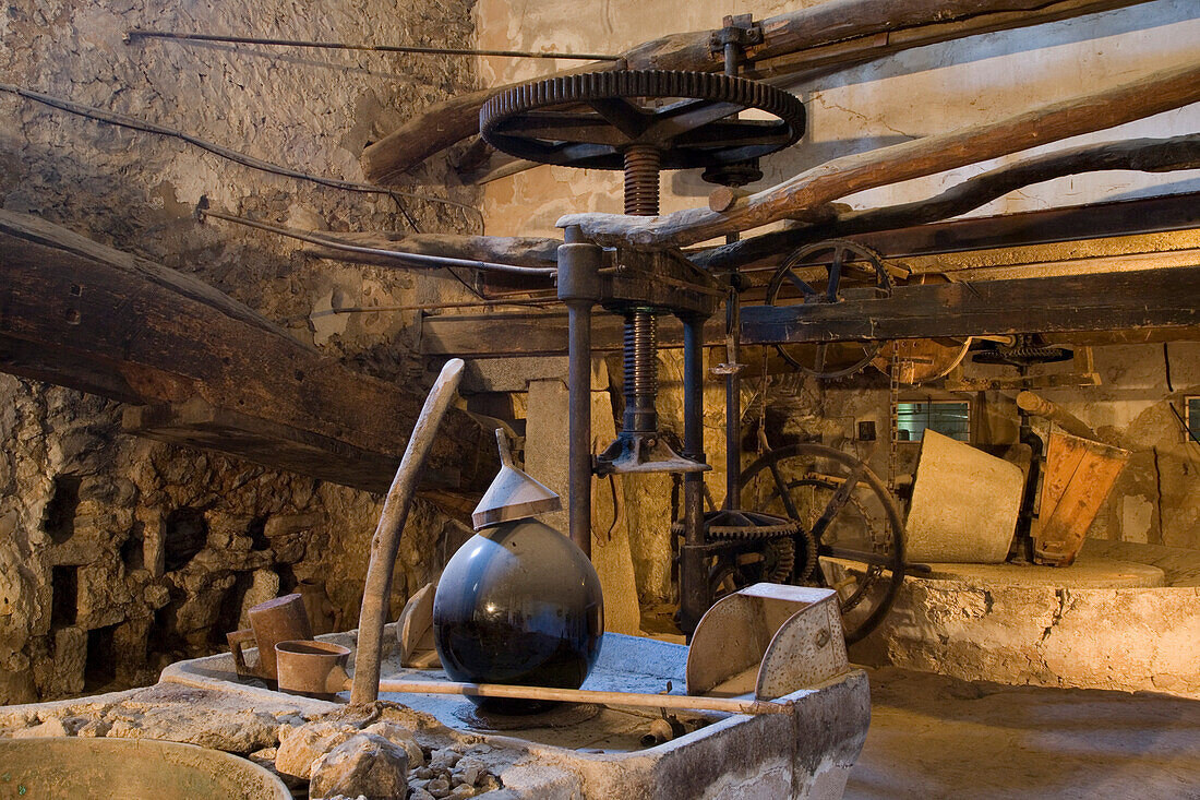 Traditional olive press at Son Pont Agroturismo finca hotel, near Puigpunyent, Mallorca, Balearic Islands, Spain