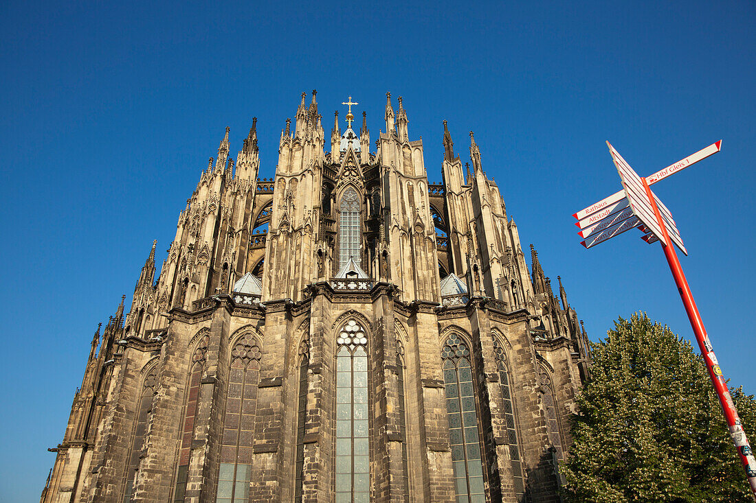 Apse of the cathedral with touristic information sign, Cologne, Rhine river, North Rhine-Westphalia, Germany