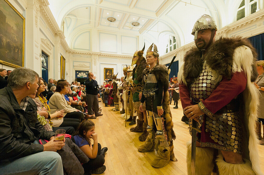 Judging Adults In The Annual Costume Competition Run By The Bonfire Council (Bonco) In Lewes Town Hall, East Sussex, Uk
