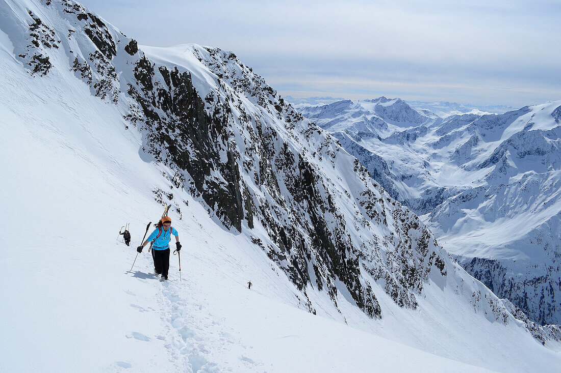 Female backcountry skier ascending to Ruderhofspitze, Stubai Alps, Tyrol, Austria