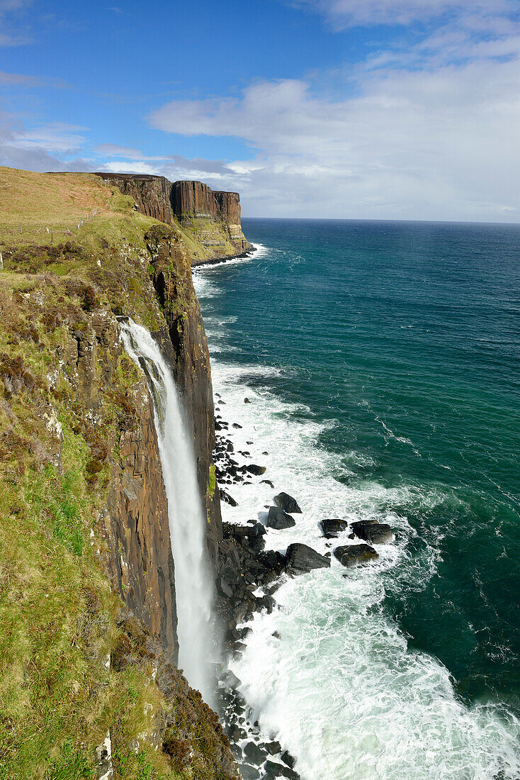 Kilt rock waterfall falling into Atlantic Ocean, Kilt rock Waterfall, Isle of Skye, Scotland, Great Britain, United Kingdom