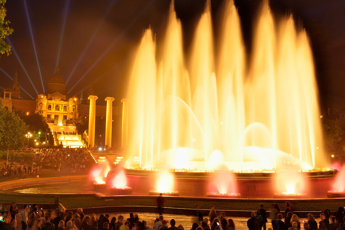 Illuminated fountain Font Magica and Palau Nacional at night, National Museum, Montjuic, Barcelona, Catalonia, Spain