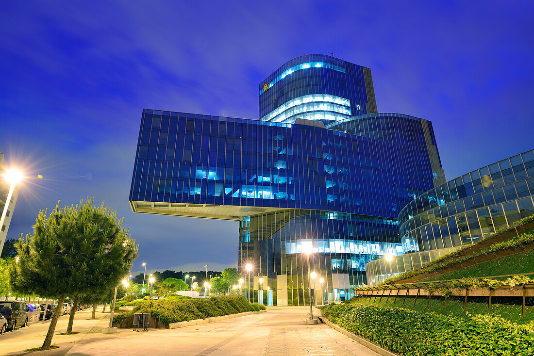 Modern building, illuminated at night, gasNatural, architects Enric Miralles and Benedetta Tagliabue, Barceloneta, Barcelona, Catalonia, Spain