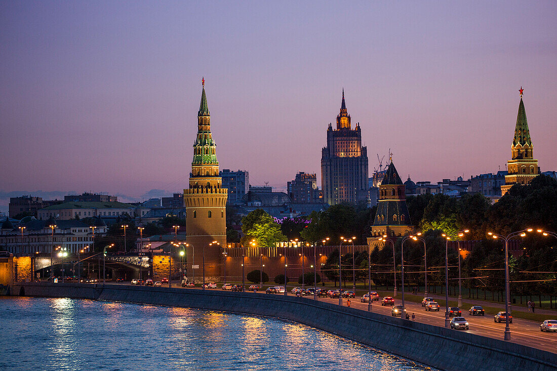 Moskva river and illuminated Kremlin buildings at dusk, Moscow, Russia, Europe