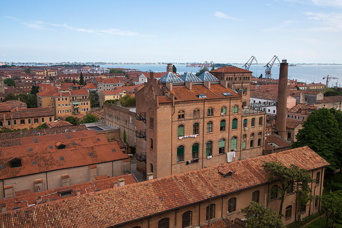 View of Fortuny fabrics factory from the rooftop of the Hilton Molino Stucky Venice Hotel in Giudecca, Venice, Veneto, Italy, Europe