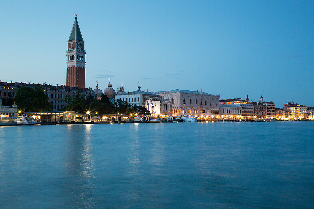 Campanile and Palazzo Ducale seen from Punta della Dogana at dusk, Venice, Veneto, Italy, Europe